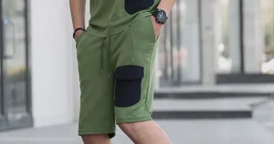 What color shirt goes with green shorts