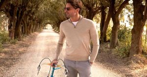 What color shirt with grey pants