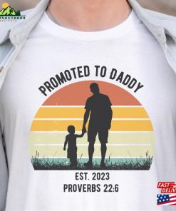 Promoted To Daddy Est 2023 T-Shirt Christian New Dad Tee Bible Verse Shirt Hoodie
